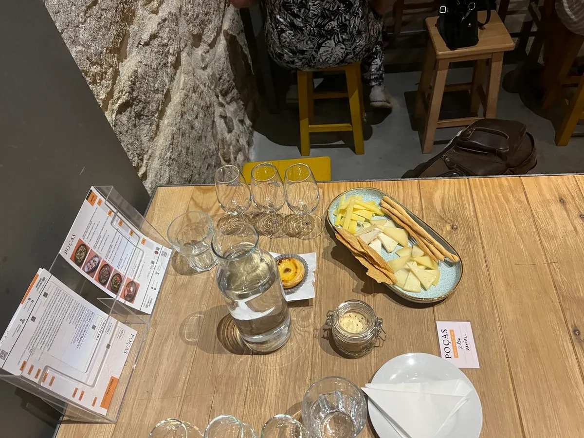 A port tasting laid out on a table at the Poças lodge, seen on a port wine cellar tour in Vila Nova de Gaia