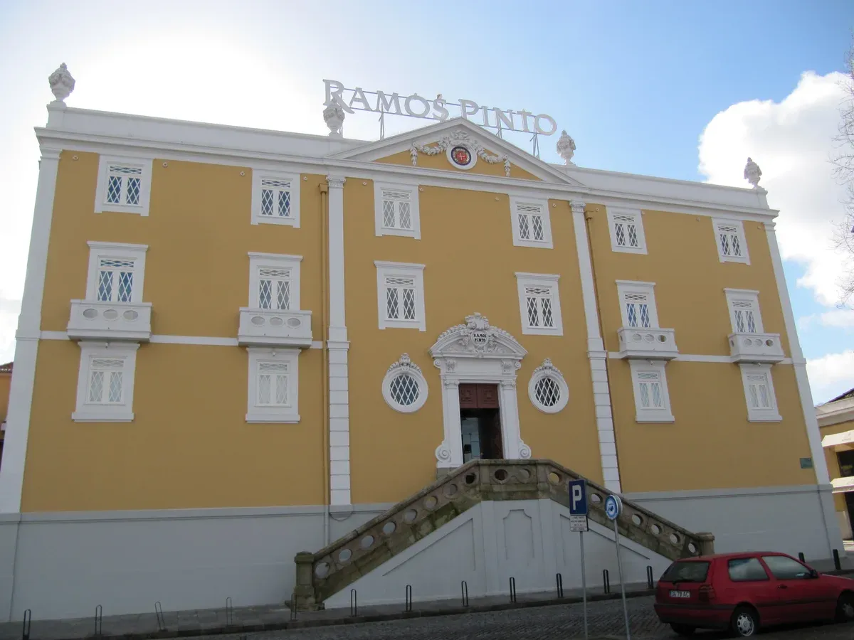 The yellow Ramos Pinto building in Vila Nova de Gaia, a cellar near the Porto wine cellar tours